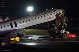 2 NYC air traffic controllers left work early before crash, AP source says