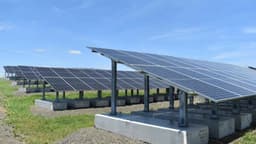 A Connecticut city stood 1,920 solar panels on a sealed garbage hill where no steel post can go in, because a driven pile would punch through the lid keeping decades of trash away from the water, so c