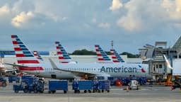 American Airlines says airfares will stay high despite fuel drop