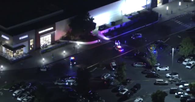 Woman found shot in car outside of Los Cerritos Center