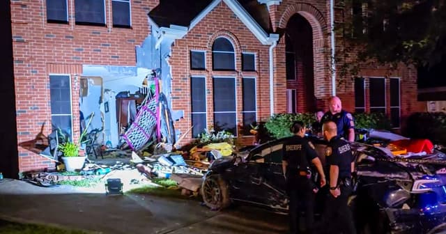 Tesla driver whose car slammed into Texas home overrode driver assistance mode, NTSB says