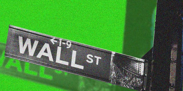 Stocks close with slight losses as Fed fuels hope that rate hikes can wait