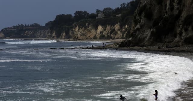 Malibu kayaker reportedly bitten by shark twice, knocked into water