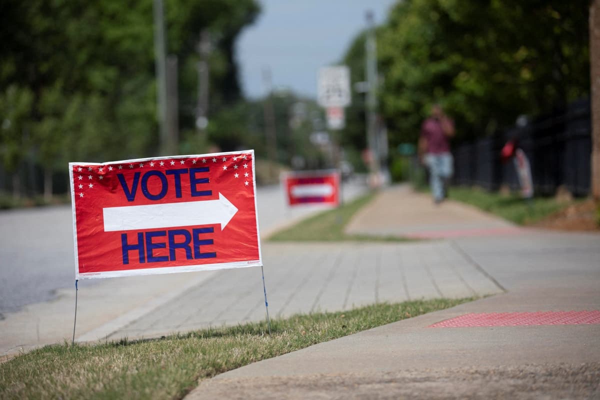 Georgia early voting sets record on first day, Raffensperger says